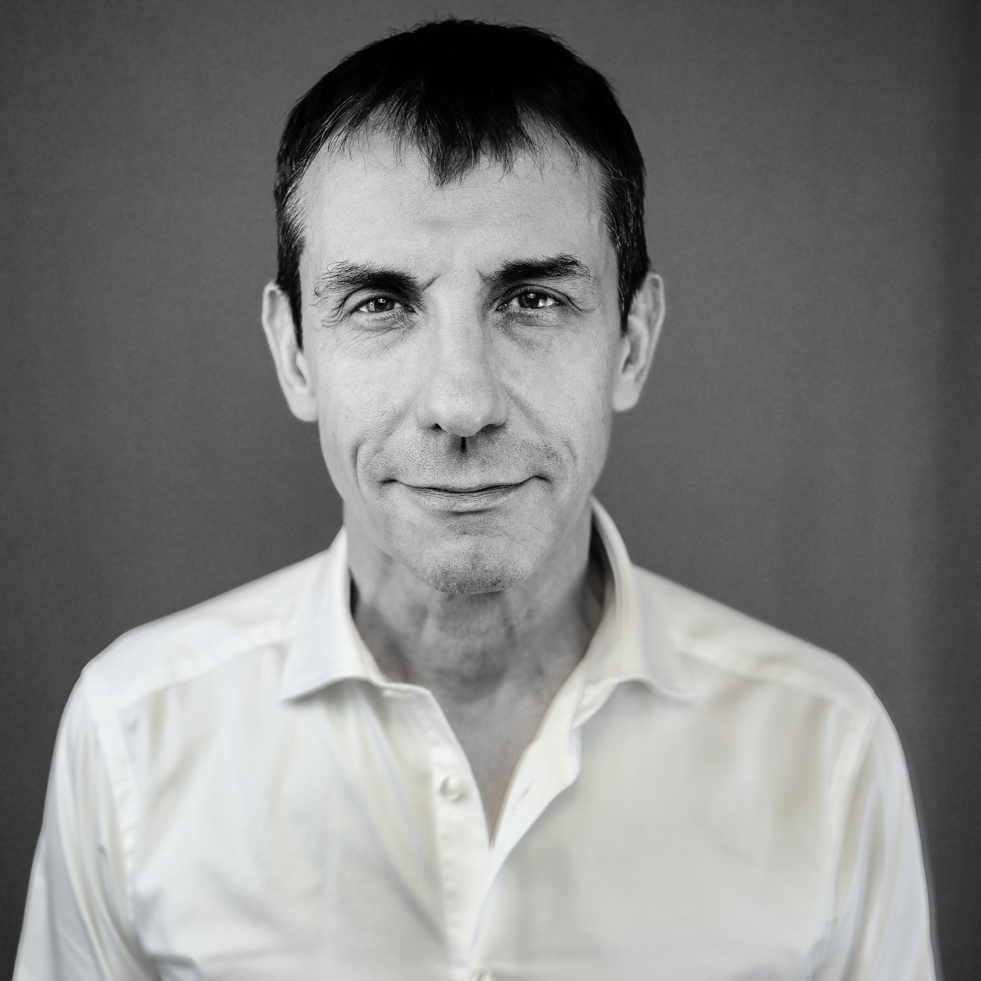 Black-and-white portrait of Philippe Goldner